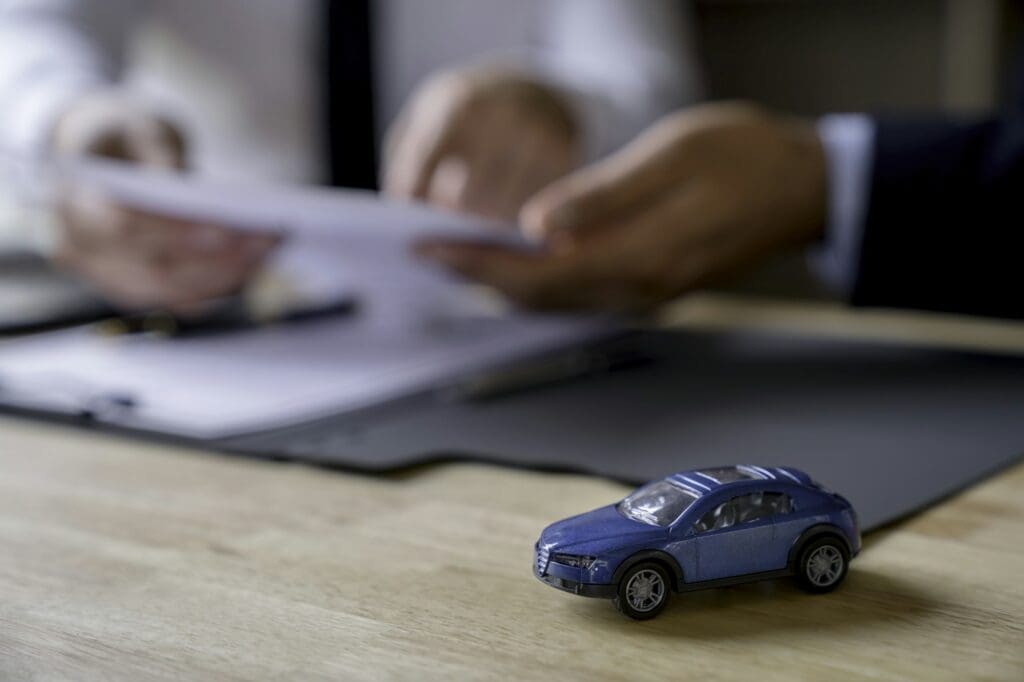 Insurance brokers are negotiating car insurance with customers, insurance, contracts.
