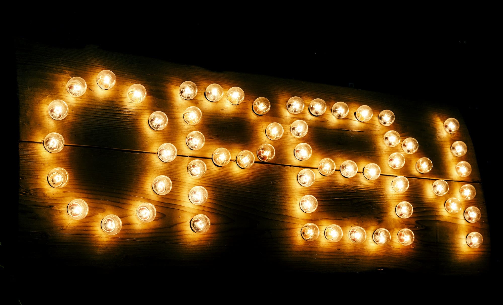 Light bulb 'Open' sign